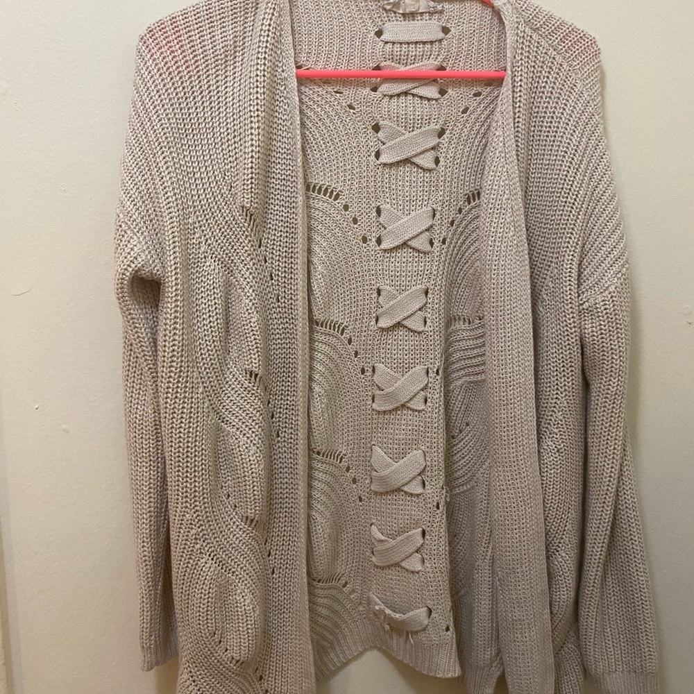 Beige cardigan with detailed back. Size large.